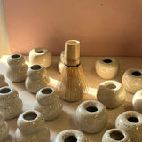 Držáky na metličky na Matcha od Studio Wiss